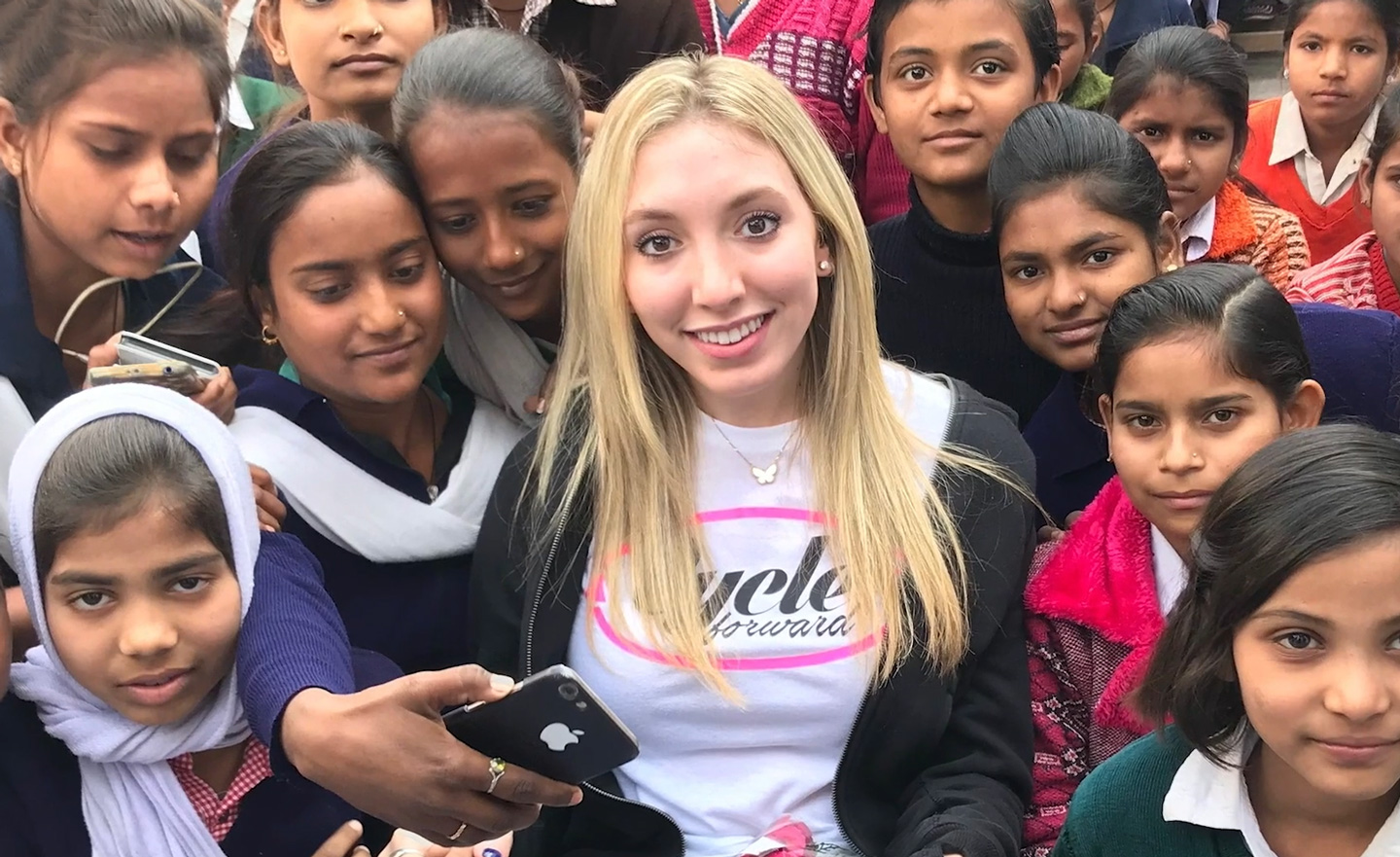 Sophie in a crowd of Indian girls.