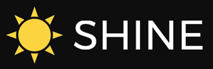 The logo is a clipart yellow sun and white text with the word Shine on a black background.