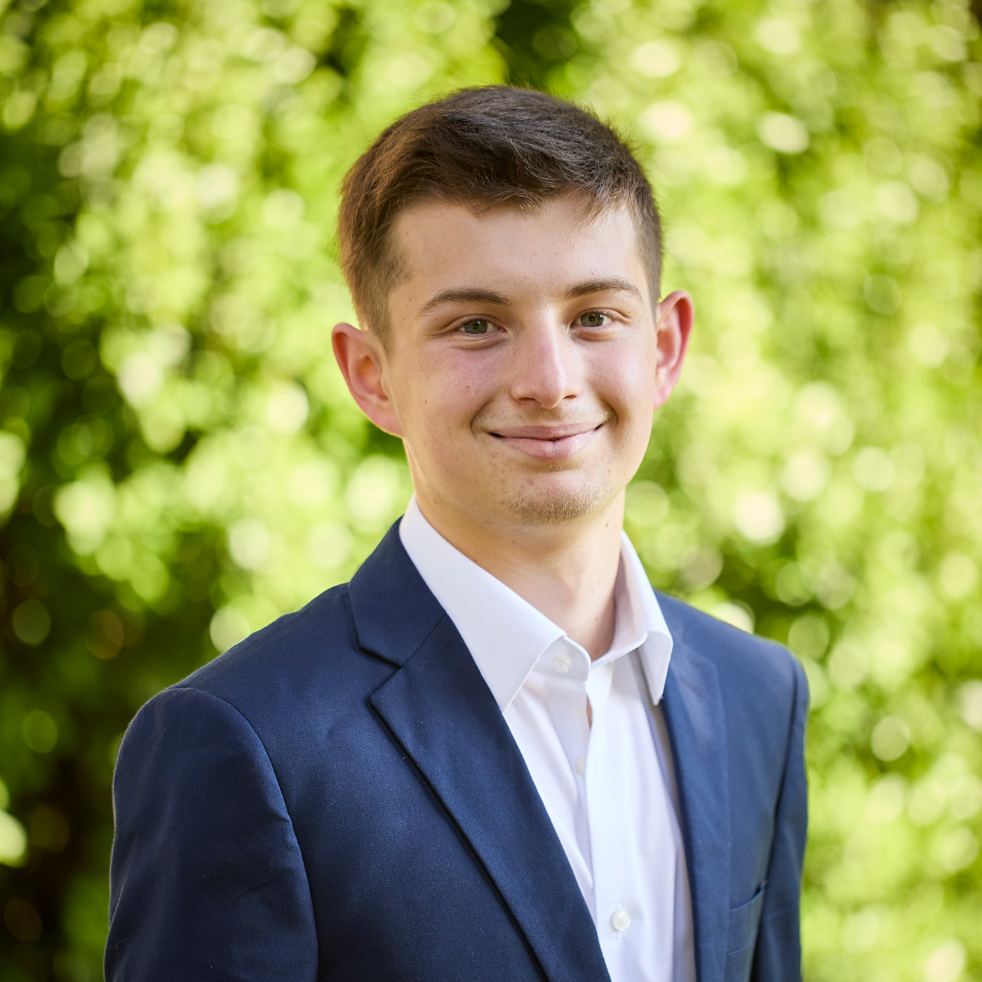 Headshot photo of Ari Bushler