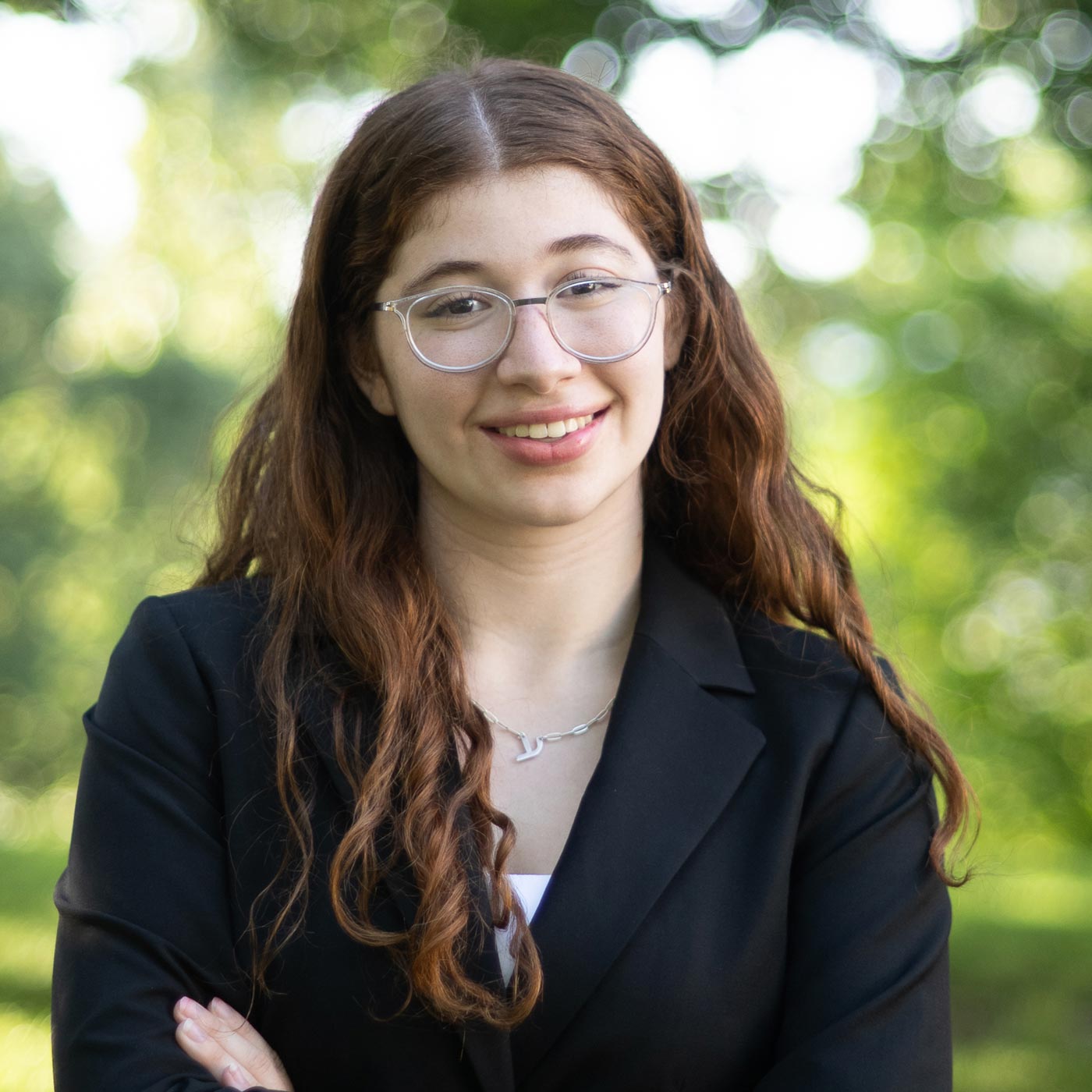 Headshot Photo of Emmie Wolf-Dubin